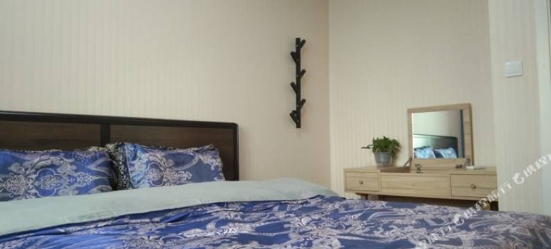 花开盛夏的温馨小家公寓(咸阳2号店)图片