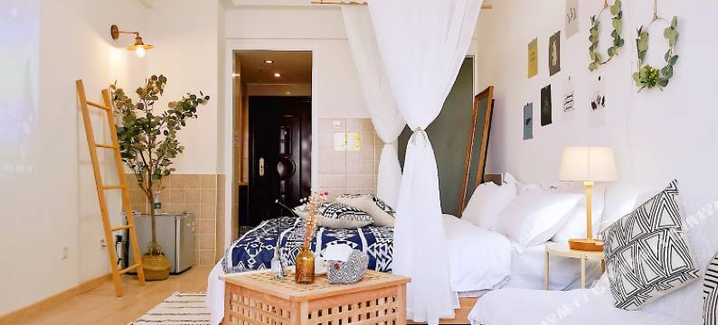 寓间里民宿(长沙河西王府井店)图片