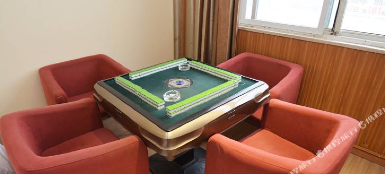 懒虫酒店(许昌曹魏古城胖东来生活广场店)图片