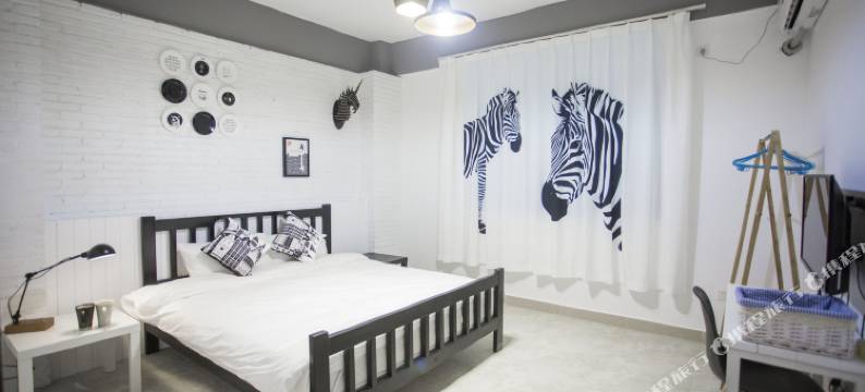 三亚等花儿开艺术民宿图片