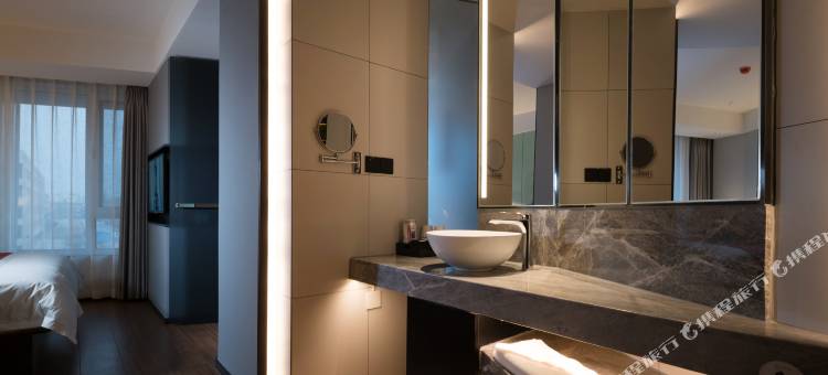 艾居璞雅精品酒店(营口鲅鱼圈区月亮湖公园店)图片