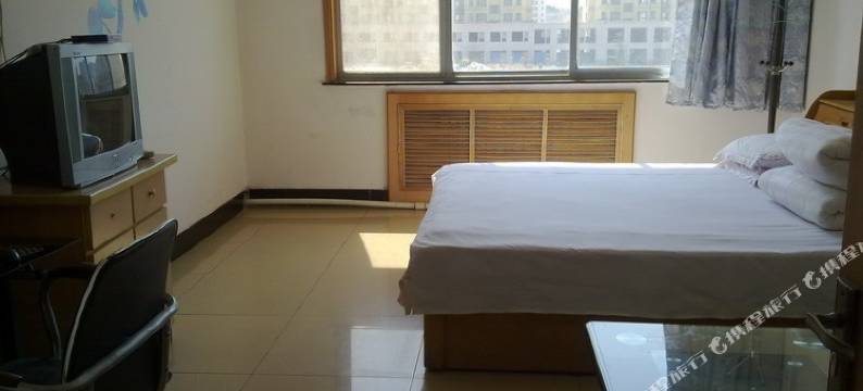 明伟招待所(威海文登新汽车站店)图片