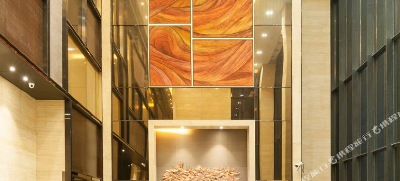 易成假日公寓(广州琶洲会展中心保利世贸博览馆店)图片