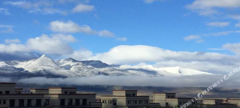 理塘眷恋之都酒店图片