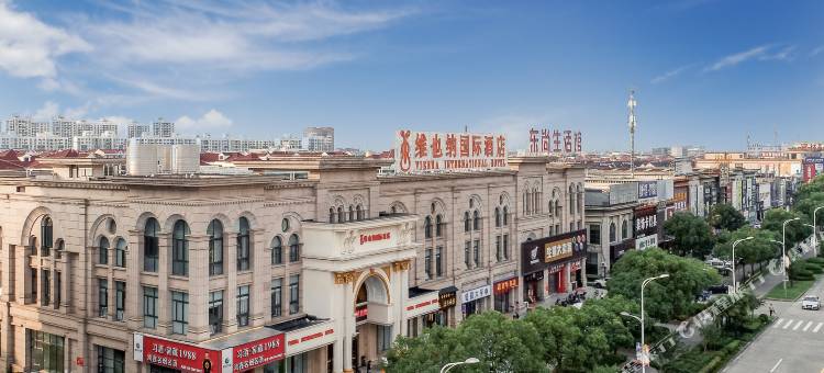 维也纳国际酒店(上海金山卫火车站城市沙滩店)图片