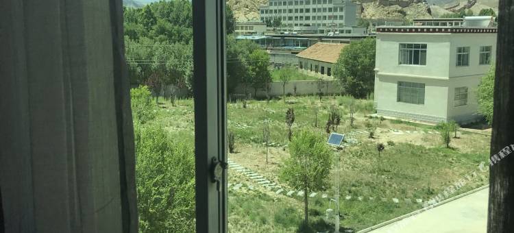 江孜明湖饭店图片