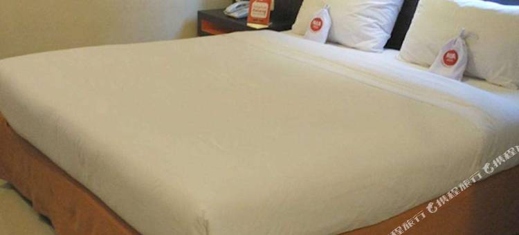 默默特罗苏卡索塔曼柯塔尼达酒店(Nida Rooms Sukarso Taman Kota Metro)图片