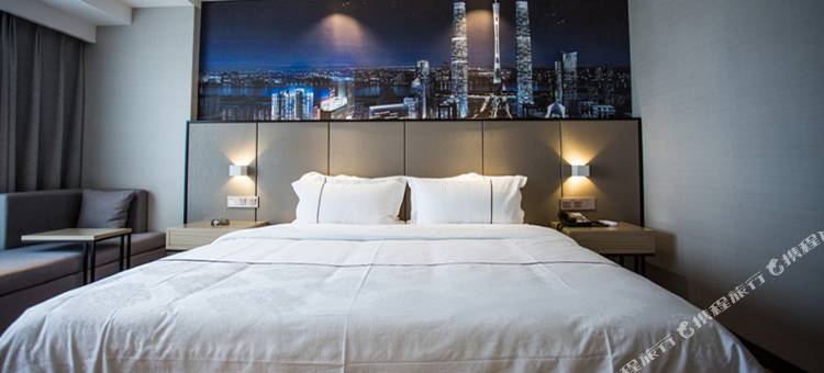 月伴湾商务酒店(长葛市政府葛天源轻轨站店)图片