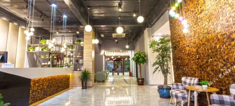 张家港迷白艺术酒店(大成广场店)图片