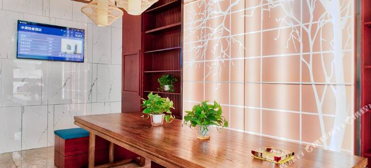 净漫轻奢酒店(新乡平原路胖东来百货店)图片