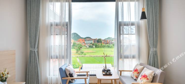 花美时自在旅居精品民宿(普者黑风景区青龙山店)图片