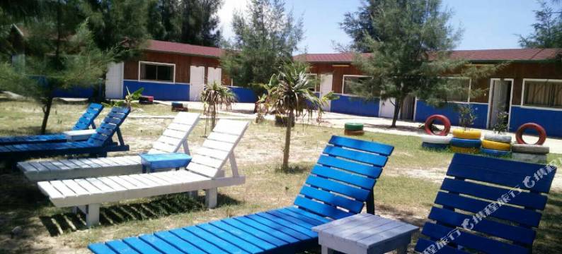 涠洲夕阳海岸沙滩木屋图片