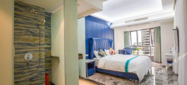 海口绿橙主题酒店(高铁东站吾悦广场店)图片