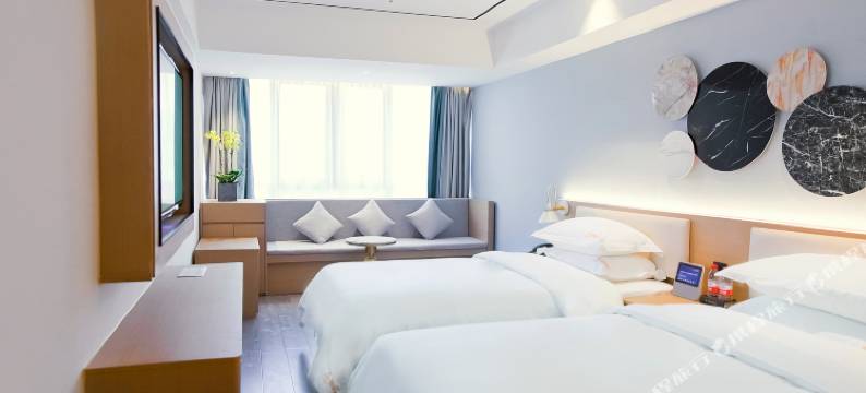 咖曼酒店(万象城六沟垅地铁站店)图片