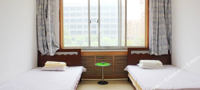 明伟招待所(威海文登新汽车站店)图片