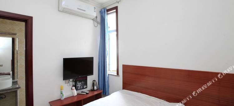 新津忠义商务酒店图片