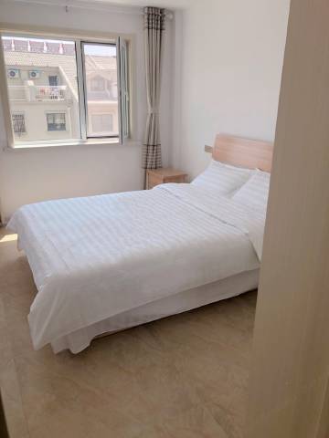 蓬莱周鑫洋公寓