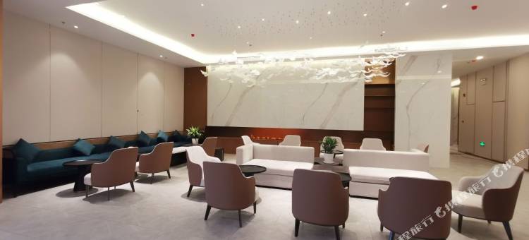 青岛崂山区石老人海水浴场桔子水晶酒店图片