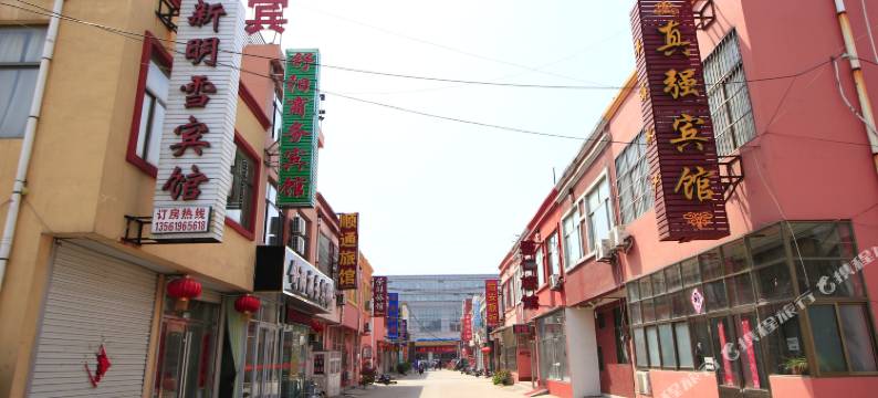 新明雪宾馆(岚山日百万德福店)图片