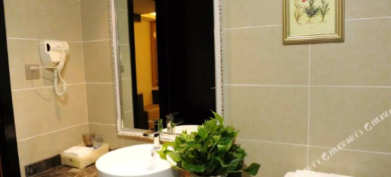 渭南曼城酒店(渭南北站乐天大街店)图片