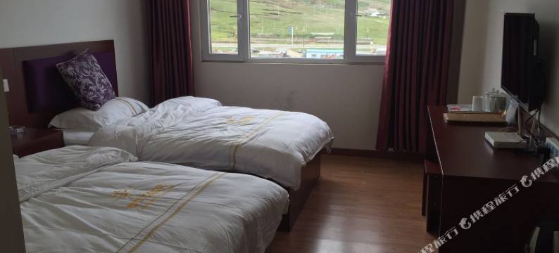 理塘眷恋之都酒店图片