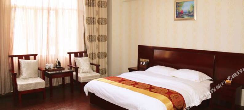 盈江华春商务酒店(新客运站店)图片