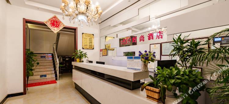 OYO郑州君子兰时尚酒店(高新郑州大学店)图片