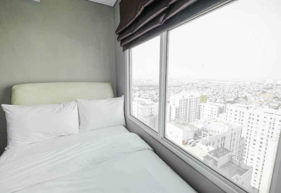 Homey 1Br Sea View Condominium at Green Bay Apartment by Travelio Hotel Overview