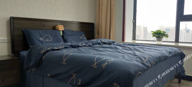 花开盛夏的温馨小家公寓(咸阳2号店)图片