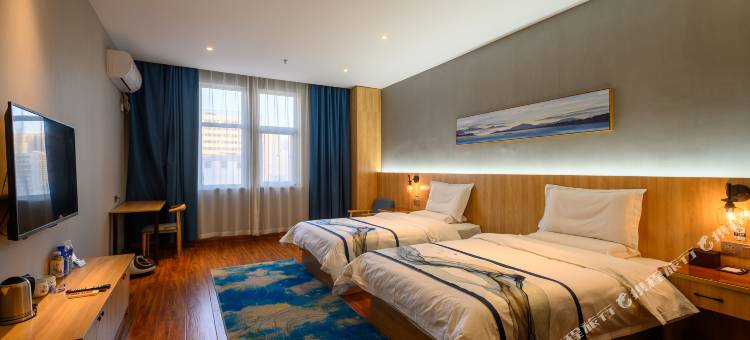 净漫轻奢酒店(新乡平原路胖东来百货店)图片