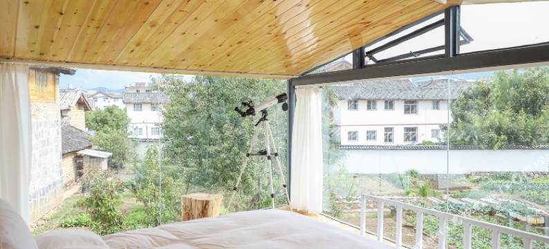 玉龙等风民宿图片