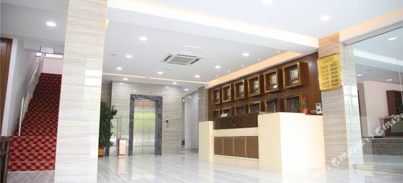 万华晟居宾馆(蓬莱新汽车站店)图片