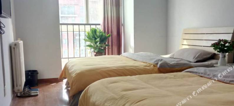 郑州悠然居青旅(郑东万象城高铁东站店)图片