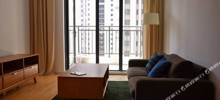 青岛化羽成蝶公寓图片