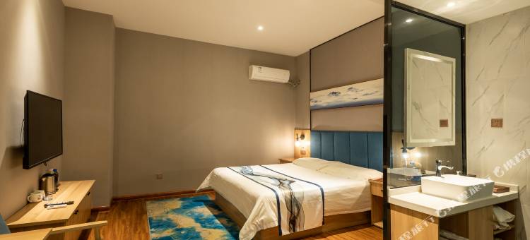 净漫轻奢酒店(新乡平原路胖东来百货店)图片