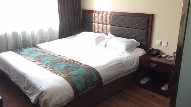 哈尔滨晟佳商务宾馆(工人文化宫地铁站革新教堂广场店)