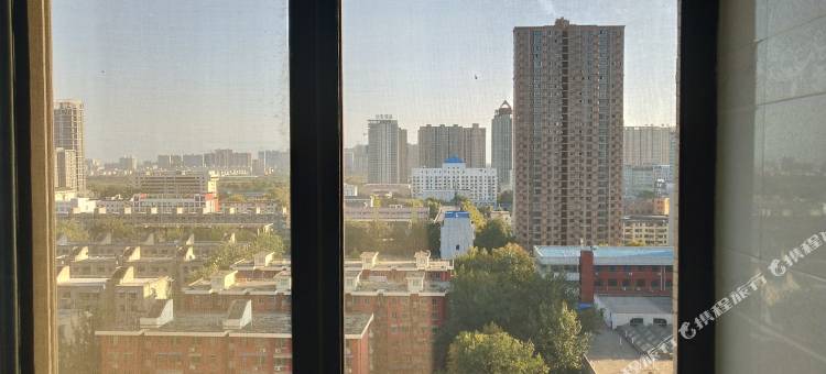 花开盛夏的温馨小家公寓(咸阳2号店)图片