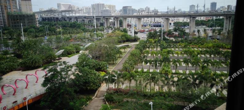 海口绿橙主题酒店(高铁东站吾悦广场店)图片