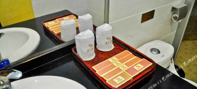 旭华酒店(广州增城新塘轻轨地铁站店)图片