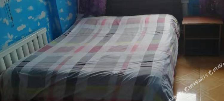 绥棱四海店镇心悦旅店图片