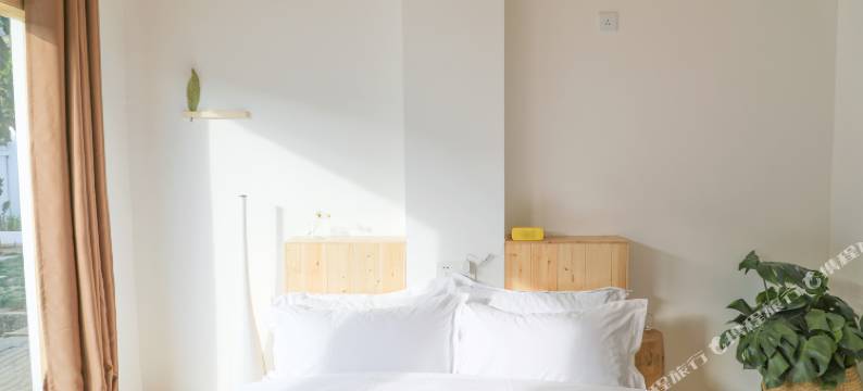 玉龙等风民宿图片