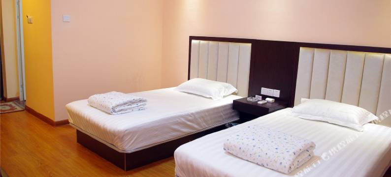 新郑靠谱宾馆(宝相寺步行街店)图片