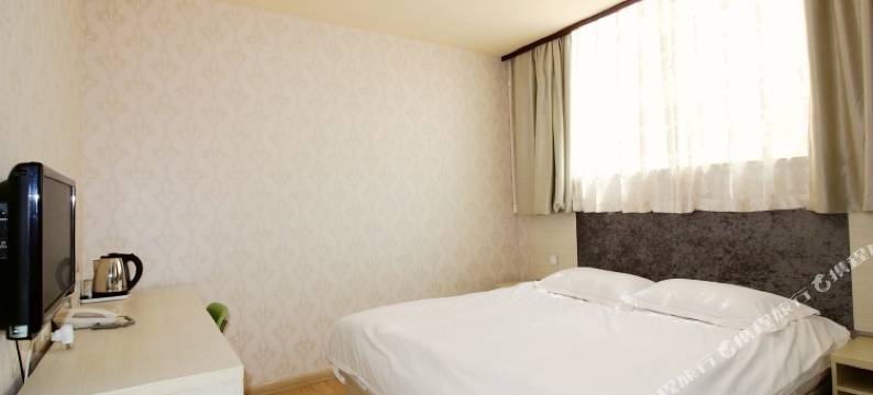 爱客100连锁宾馆(青岛流亭商务区二店)图片