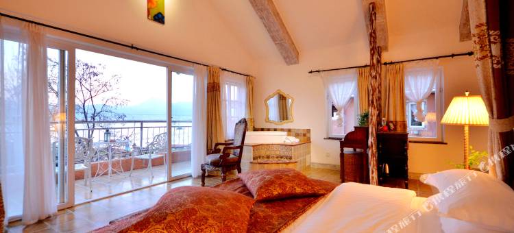 丽江逸人水岸城堡客栈图片