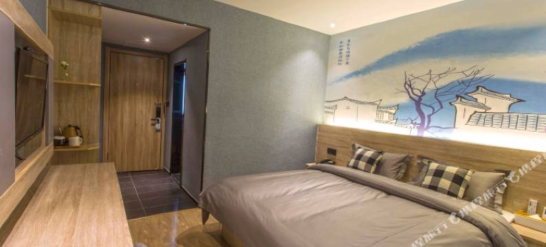 张家港迷白艺术酒店(大成广场店)图片