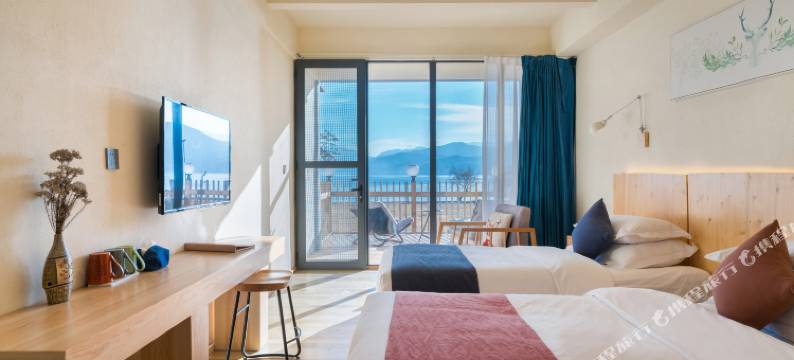 晏坐湖景清奢民宿(泸沽湖猪槽船游湖大落水村店)图片