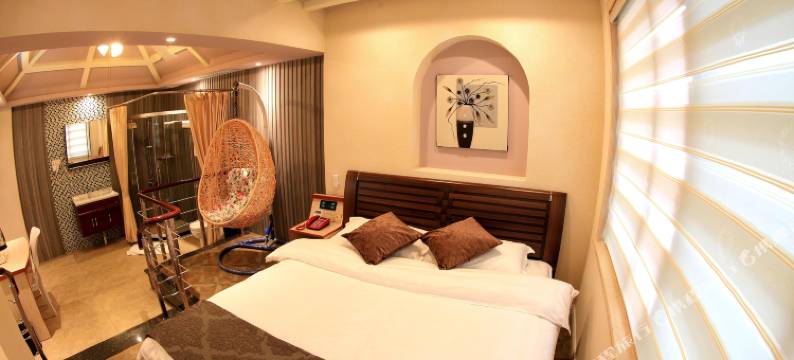 达州美沸尔河景主题酒店图片