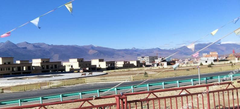 理塘眷恋之都酒店图片