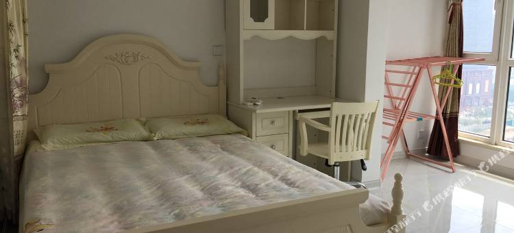 青岛金沙滩凤凰金岸套三精装房普通公寓图片