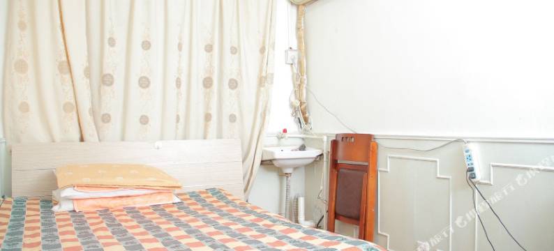 青岛开源旅馆图片